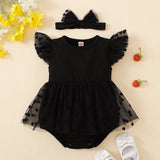 Black polka romper